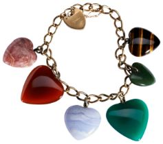 A VICTORIAN GOLD AND AGATE BRACELET, CIRCA 1890 suspending six hardstone hearts to include tiger's