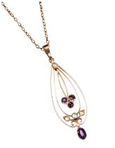AN AMETHYST AND SEED PEARL NECKLACE, CIRCA 1890 the central articulated drop of a trefoil of round