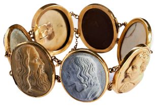 A VICTORIAN LAVA CAMEO BRACELET, CIRCA 1870  composed of seven vari-coloured lava cameos of