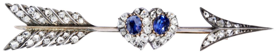 A LATE VICTORIAN DIAMOND AND SAPPHIRE ARROW BROOCH, CIRCA 1890  the two circular mixed-cut sapphires