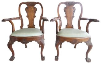 A GOOD SET OF SIX WALNUT DINING CHAIRS, LATE 19TH CENTURY, the pair of armchairs with carved eagle