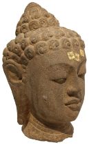 A SOUTH EAST ASIAN BUDDHA STONE HEAD, 45cm high **PLEASE NOTE: THIS AUCTION IS IN HONG KONG.