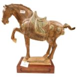 A LARGE CHINESE GLAZED POTTERY HORSE, TANG DYNASTY OR LATER 44cm high, 56cm long **PLEASE NOTE: THIS
