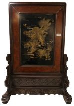 A CHINESE HARDWOOD SCREEN DEPICTING A DRAGON, LATE 19TH / EARLY 20TH CENTURY 85cm high x 57cm
