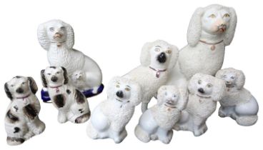A GOOD SELECTION OF STAFFORDSHIRE KING CHARLES DOGS (9) LATE 19TH CENTURY **PLEASE NOTE: THIS