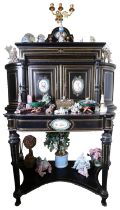 AN EBONISED AND BRASS INLAID BONHEUR DU JOUR CABINET WITH OVAL DECORATED PANELS UPON A SHAPED