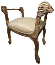 A GOOD REGENCY STYLE GILT DECORATED RAMS HEAD STOOL, EARLY 20TH CENTURY,  upon gilt decorated