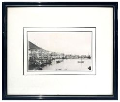 A PAIR OF FRAMED HONG KONG PHOTOGRAPHS, black and white (unsigned), 18x28cm **PLEASE NOTE: THIS