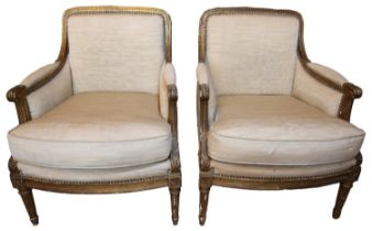 A PAIR OF FRENCH GILDED FAUTEUIL ARMCHAIRS  LATE 19TH CENTURY with acanthus carved decoration upon