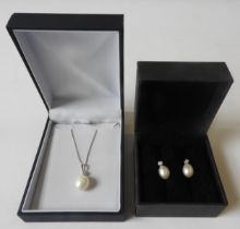 A PEARL AND DIAMOND PENDANT AND A PAIR OF PEARL AND DIAMOND EARRINGS, the pendant in an 18ct white