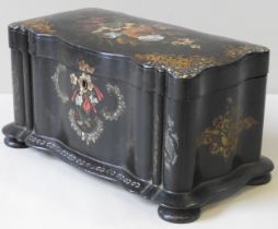 A VICTORIAN PAPIER MACHE TEA CADDY, CIRCA 1860, rectangular form with undulating serpentine