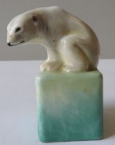 A VINTAGE ROYAL DOULTON POLAR BEAR MODEL, stylistically modelled crouched atop a block of ice,