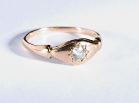 A DIAMOND RING the old brilliant-cut diamond star set on a plain gold mount. Marked '9CT' Total