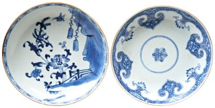 TWO BLUE AND WHITE DISHES QING DYNASTY, 18TH CENTURY one decorated with stylised plants and