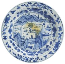 A BLUE AND WHITE 'LANDSCAPE' DISH WANLI PERIOD (1573-1619) centrally decorated in underglaze blue