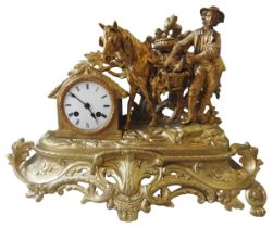 A 19TH CENTURY LACQUERED SPELTER MANTEL CLOCK, the 8cm enamelled dial housed in a hut shaped case,