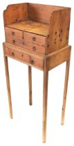 A 19TH CENTURY WAXED PINE CLERK'S STAND, three quarter galleried rectangular top above two short and