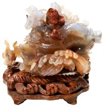 CARVED AGATE GROUP REPUBLIC PERIOD  depicting Shoulao and a boy atop a lily pad and crashing