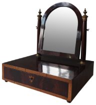 A FRENCH EARLY 19TH CENTURY TOILET MIRROR, the arch plate supported by twin Doric pillar supports