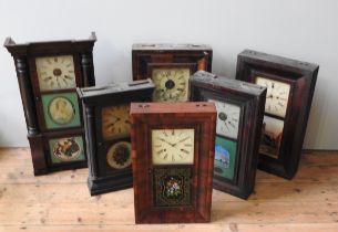 A GROUP OF SIX 19TH CENTURY AMERICAN WALL CLOCKS, all with Roman dials and eglomise panels