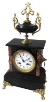 A 19TH CENTURY SLATE BRACKET CLOCK, the rectangular form case housing a 9 cm enamelled dial, flanked