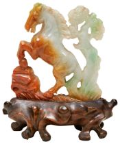 CARVED JADIETE HORSE REPUBLIC PERIOD on a fitted hardwood stand 7cm high PROVENANCE: From a