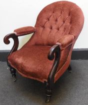 A LATE VICTORIAN MAHOGANY NURSING CHAIR, CIRCA 1870, with button upholstered arch back above an