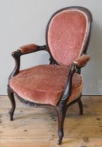 A 19TH CENTURY MAHOGANY FRAMED FAUTEUIL, padded balloon back over a serpentine front seat, flanked