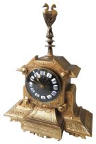 A GILDED CAST METAL MANTEL CLOCK, 20TH CENTURY, breakfront form case, 9.5 cm metal dial with