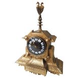 A GILDED CAST METAL MANTEL CLOCK, 20TH CENTURY, breakfront form case, 9.5 cm metal dial with