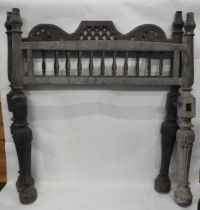 A CONTINENTAL 19TH CENTURY BED STEAD, the headboard comprised of a pierced lattice & floral carved