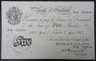 AN UNCIRCULATED BANK OF ENGLAND WHITE FIVE POUND NOTE, 1945, signed Peppiatt and dated 7th April