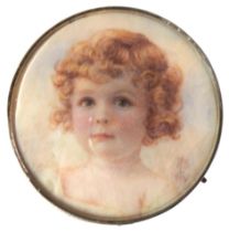 AN EARLY 20TH CENTURY PORTRAIT MINIATURE OF CHILD, hand painted on a circular panel in a yellow