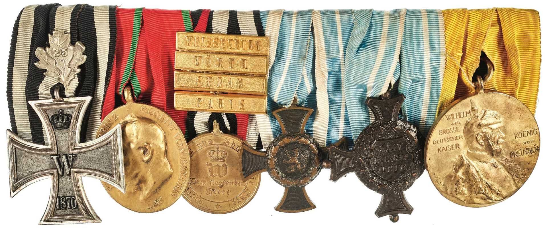 Ordensspange mit 6x Auszeichnungen, dabei Preußen Eisernes Kreuz 1870 2. Klasse mit aufgelegter nach