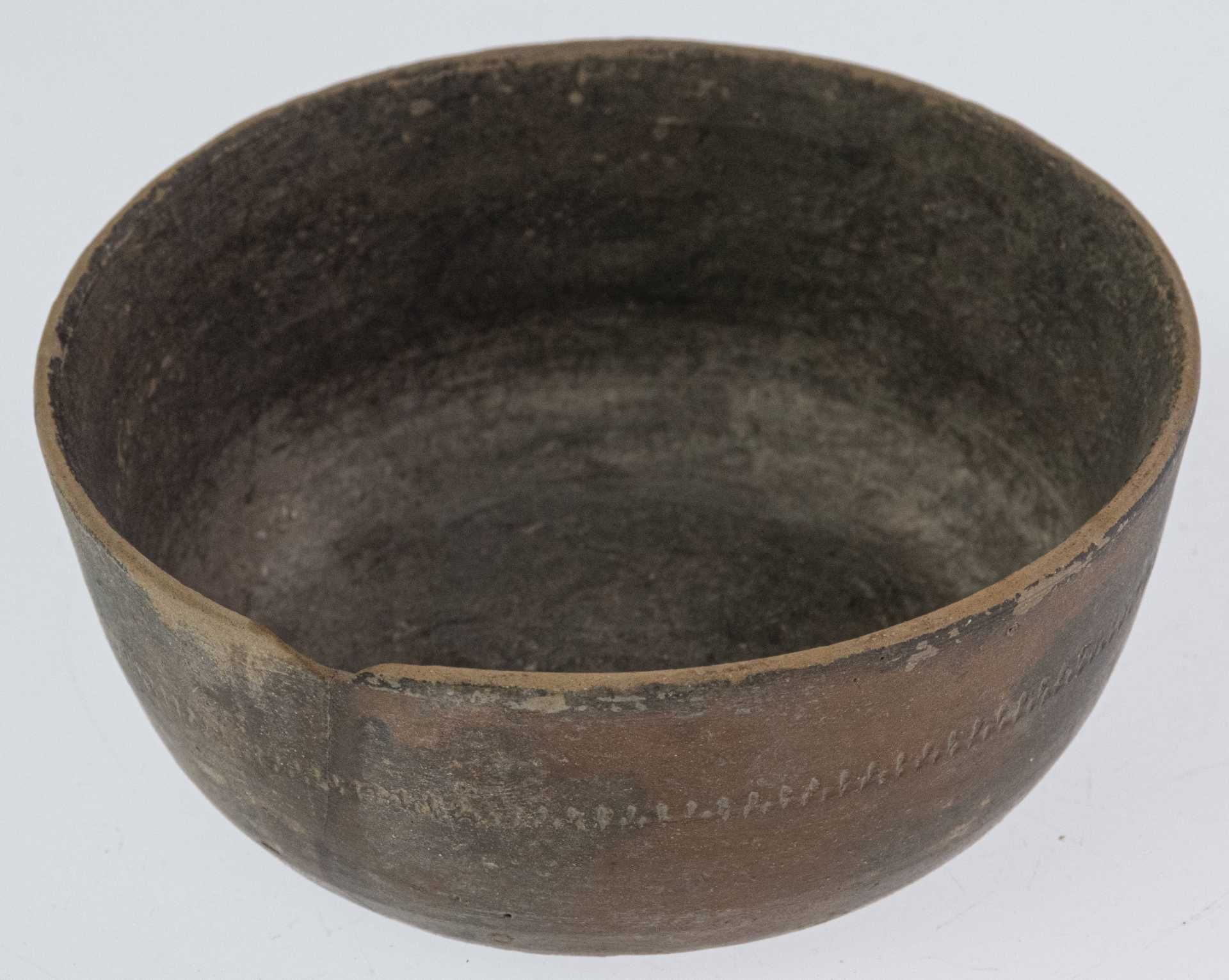 Small bowl from brown clay, glued breakage, small defect at the edge, height approximate 3 cm; diame - Image 2 of 2