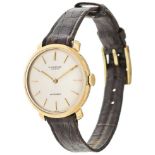 IWC womens watch. Ca. 24 mm, 750er yellow gold, automatic. Silver-coloured dial with golden hands an