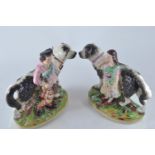 Pair of Staffordshire figures of royal children & St. Bernard dogs, 24.8cm & 22.2cm high respectivel