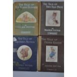 Four early editions of Beatrix Potter books, including 1st editions of The Tale of Peter Rabbit and