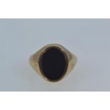 9ct gold & black onyx signet ring, hallmarked Birmingham 1977, size V, gross weight 10.95 grams