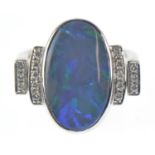 18ct white gold, black opal & diamond ring, the swivel top with a collet-set approx. 6.24 carat opal