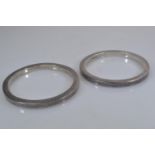 Pair of silver bangles, hallmarked London 2002, inner diameter 68mm, gross weight 180.8 grams