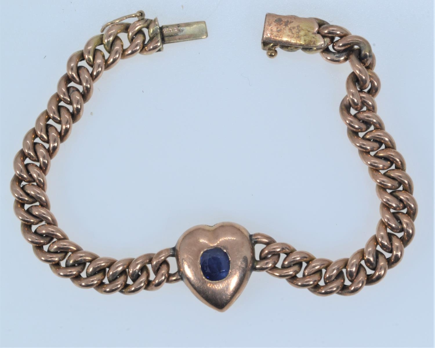 Victorian yellow metal & sapphire keepsake bracelet, tests positive for 9ct gold, the central heart 