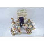 Sixteen 1950's and 60's Beswick Beatrix Potter characters including Lady Mouse, Mr. Jeremy Fisher an