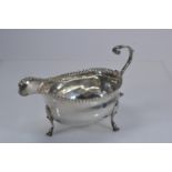 George IV silver sauceboat, maker's mark IS possibly for John Sidaway, London 1821, crested, length