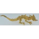 9ct gold dragon pendant, hallmarked London, length 56mm, 6.13 grams