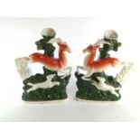 Pair of Staffordshire deer & hound spill vases, height 29cm