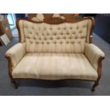 Rococo style lounge couch with four original castors. With cream, green and gold coloured upholstery