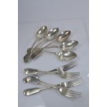 Five silver fiddle pattern dessert spoons & four silver fiddle pattern dessert forks, William Comyns