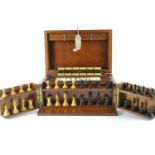 Mahogany lockable cased games compendium, including dominoes, chess, cards, drafts, Royal basique, c