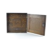 Small oak sewing box with 8 internal drawers & haberdashery contents H28cm W28cm D16cm
